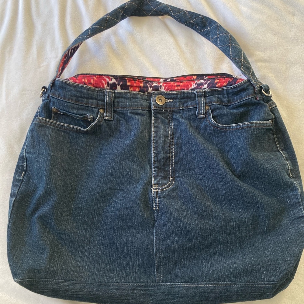Nine West jean tote with red and blue print lining